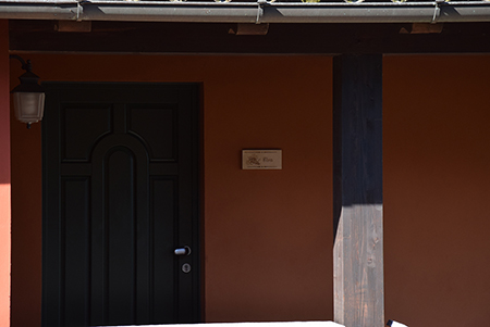 A detail of the entrance to the &quot;Grapes&quot; apartment, covered from the roof just as the stairway.